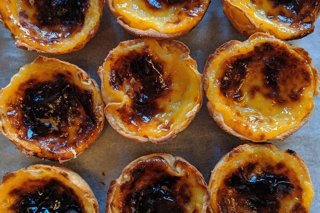 a tray of Portuguese tarts